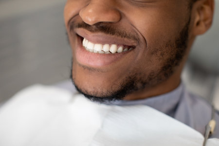 Dental Treatment. Happy Young African American Man Widely Smiling With Perfect Teethの写真素材