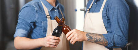 Celebration of successful business at modern factory and brewery