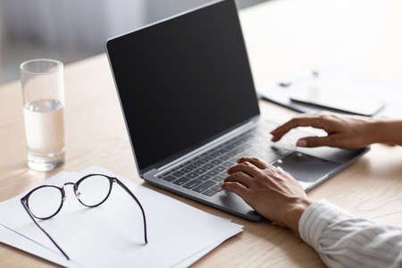 Work remotely at home or office, new normal, businesswoman or worker on workplace, good websiteの写真素材