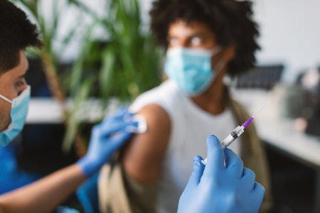 Black Man Preparing To Get Vaccinated Againstの写真素材