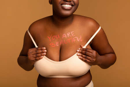 You Are Beautiful. Portrait Of Curvy Woman In Underwearの写真素材