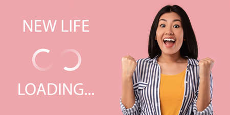 Excited young Asian woman gesturing YES on pink studio background with NEW LIFE loading throbber...