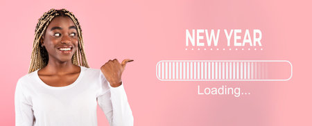 Happy black woman with Afro braids pointing aside at New Year loading bar over pink studio background, collageの写真素材