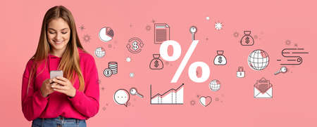 Smiling young lady checking smartphone on pink studio background. Collage with finance and economy iconsの写真素材