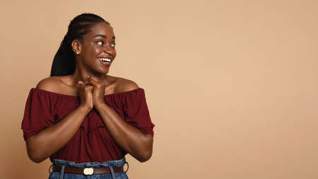 Emotional black woman looking at copy spaceの写真素材