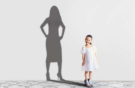 Asian Girl Wearing Moms High Heels, Wants To Be Modelの写真素材