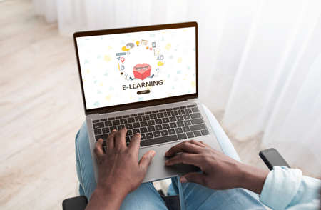 Black Man Study With Laptop At Home, Browsing E-Learning Website On Laptopの写真素材