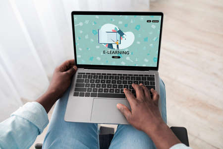 Black Man Study With Laptop At Home, Signing Up For Virtual Classroomの写真素材