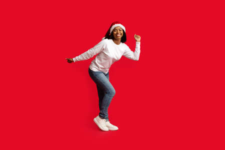 Emotional african american lady having New Year disco