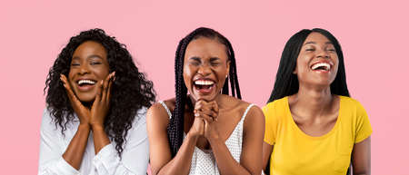 Headshots portraits of happy excited African American women laughingの写真素材