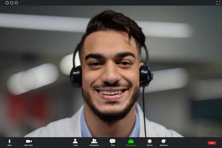 Pov screen of handsome middle eastern doctor having video chatの写真素材