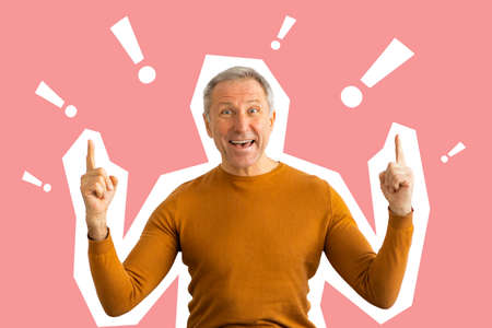 Excited senior man gesturing on pink background with exclamation marksの写真素材