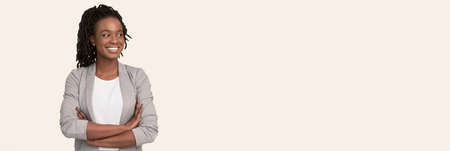Black Business Lady Smiling Looking Aside Standing On White Background
