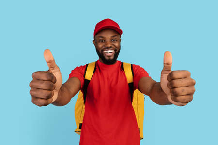 Best Delivery Service. Happy Black Courier Wearing Thermo Backpack Showing Thumb Ups