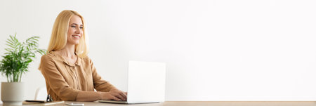 Executive Financial Woman Working On Laptop In Office, Copy Spaceの写真素材