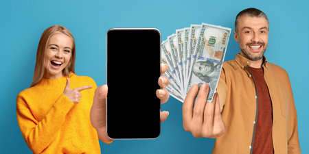 Beautiful couple won lottery on Internet, showing smartphone and cash