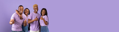 Cheerful african american young people gesturing on purpleの写真素材