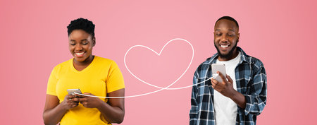 Message With Love. Young black couple texting on smartphones over pink backgroundの写真素材
