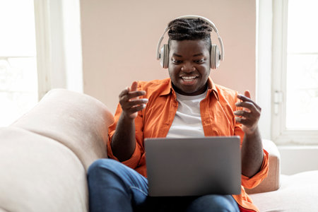 Cheerful black man have video call from home
