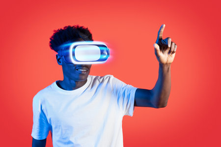 Black guy using VR goggles, virtual reality conceptの写真素材