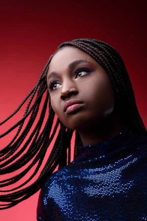 Closeup Portrait Of Black Young Woman In Sequin Dress With Braided Hair