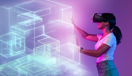 Young positive black woman in vr headset touching glowing virtual holographic cubes, enjoying modern...