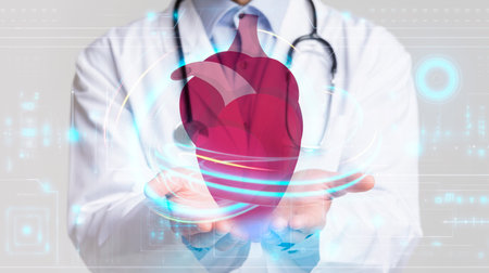 Unrecognizable doctor holding big human heart in his hands