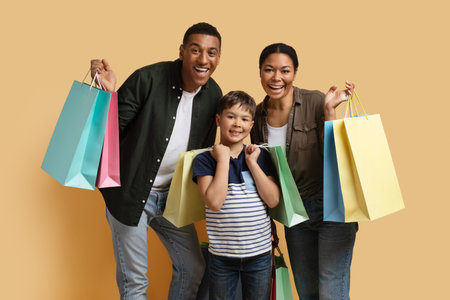 Cheerful cute young african family have shopping togetherの写真素材