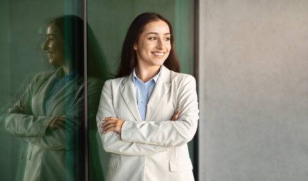 Happy pretty confident millennial woman in suit enjoy work in city outdoors, near office building