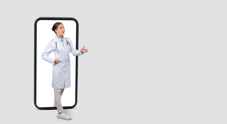 Confident glad european young doctor in white coat give hand for handshakeの写真素材