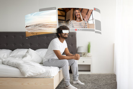 Young man embraces VR for enriching video chats with his far living girlfriend, resting on bed at...