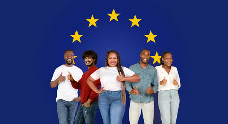 Five happy individuals of diverse ethnicities giving thumbs up, wearing casual clothesの写真素材