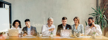 A team of diverse professionals in a meeting, with a man leading the discussion at a table