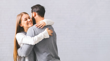 Happy Spouses Embracing After Successful Group Marriage Therapy At Counsellors Officeの写真素材