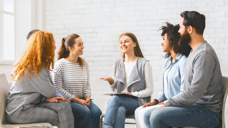 Therapist speaking to rehab group at therapy session