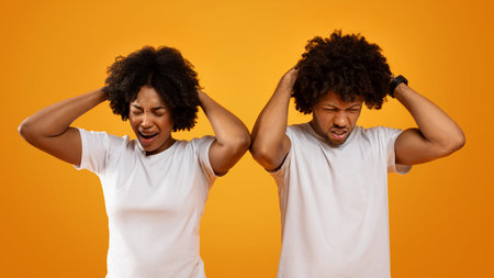 Devastated african american man and woman touching their heads