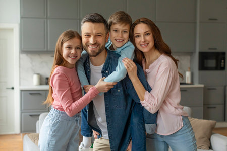 Happy family posing together in their home