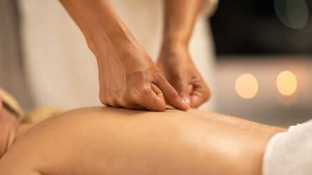 Woman Receiving Back Massage at Spa, Closeupの写真素材