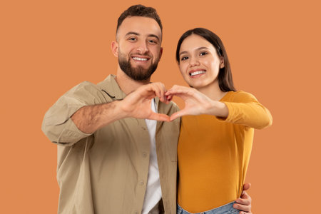 Man and Woman Making Heart With Handsの写真素材