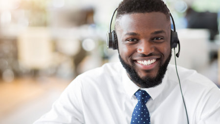 Smiling Customer Service Representative Wearing Headsetの写真素材