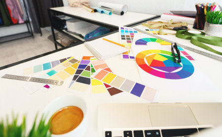 Colorful Design Workspace With Color Swatches, Creative Tools During Daytime
