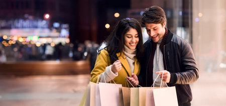 Man and Woman Holding Shopping Bags in Mallの写真素材