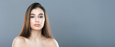 Pretty Woman With Long Brown Hair Posing for Pictureの写真素材