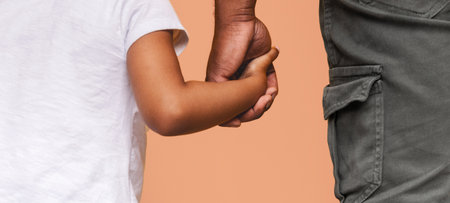 Cropped Of A Father And Daughter Holding Hands