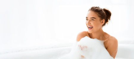 Beautiful woman taking relaxing bath with foam