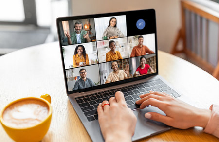 Lady Participating in Video Conference Meeting With Group of People
