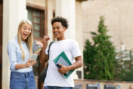 Excellent marks. Surprised students checking exam resultsの写真素材