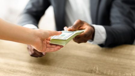 Person Receiving Cash Paymentの写真素材