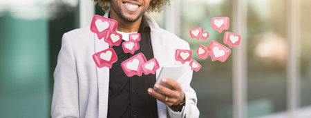 Happy Man Using Smartphone With Many Likes Notifying Himの写真素材