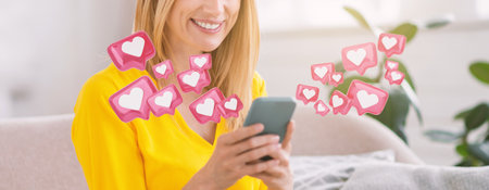 Woman Smiles While Checking Social Media On Phoneの写真素材